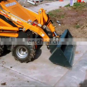 Small garden tractor loader backhoe