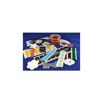 Die cut adhesive materials