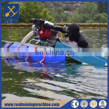 Shallow water areas using sand and gravel pumping boat for gold separation dredge