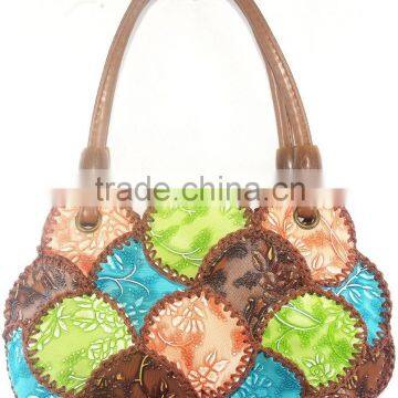 alibaba china 25 centimeter wide small size handcraft handbag light weight cowhells material durable