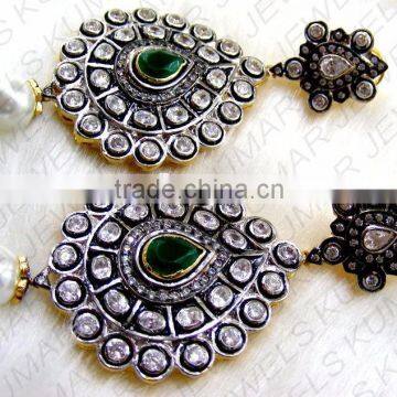 Emerald studded earrings