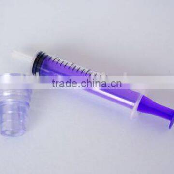 Oral syringe with adaptor