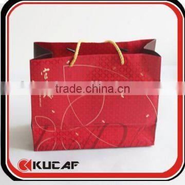 Luxury design shopping paper bag with gold hot foil logo