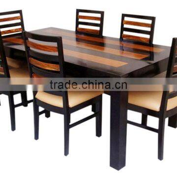 Colorful six sitter wooden dining set with cushion chair