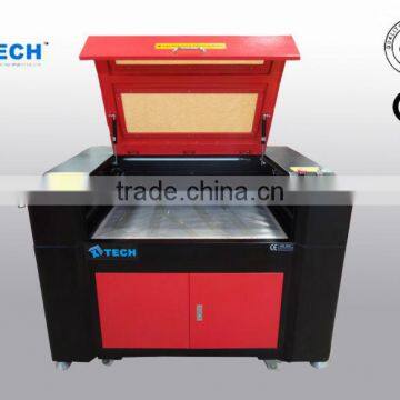 XJ-6090 red-light position laser cutting machine