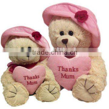 Hatted Stuffed Bear with a big pink heart & plush toys