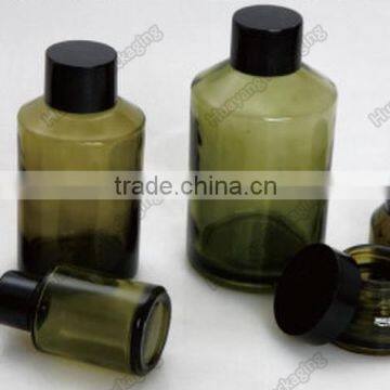 Green bottle with sloping shoulder glass oil bottle