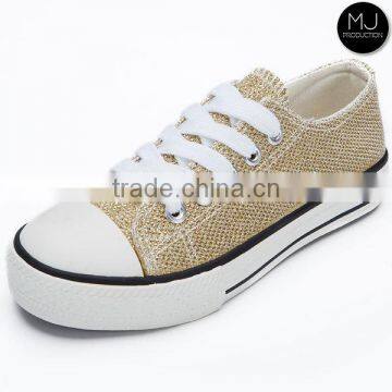 In stock gold canvas shoe woman