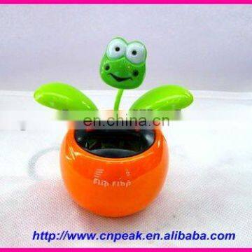 solar flip flap with frog swing