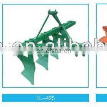Farm tractor implements moldboard plough