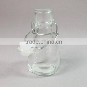 flint glass bottle for sauce condiment with swing top