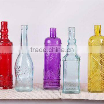 different types glass wine bottle with painting