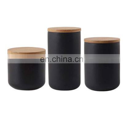 New custom certificated white black cylinder unique empty ceramic coffee tea storage bottles jar with wood lid