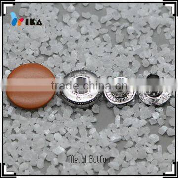 Brown painted buttons and snaps with #484 for kid's clothing