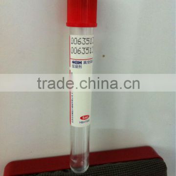 Red vacuum blood collection tubes with clot activator