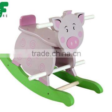 Children wooden pig rocker