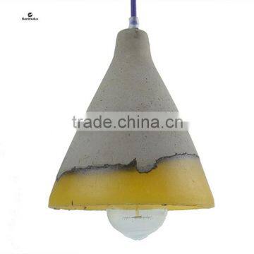 Concrete Pendant Lamp with a Boarder of Translucent Silicone Rubber that Emits a Warm Glow