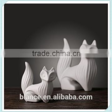 white ceramic fox figurine