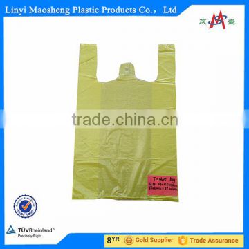 t-shirt bag with handle in roll on roll supermarket