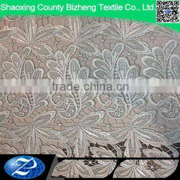 Wholesale african cupion embroidery design cord lace fabric for wedding dress