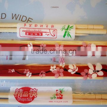 Round chinese style chopsticks and bamboo sticks packed in a OPP