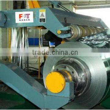 steel coil rewinder with hold down arms device