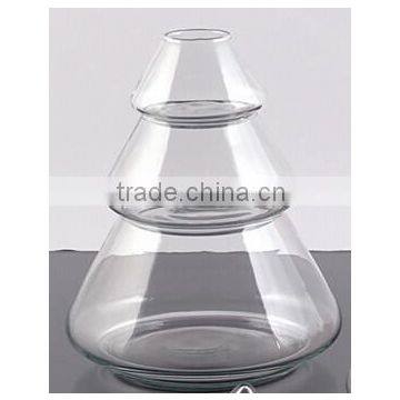 Pinetree shaped glass containers.