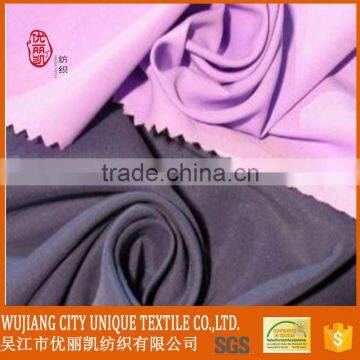 90gsm black and purple color 100% polyester microfiber peach skin fabric for beach pants