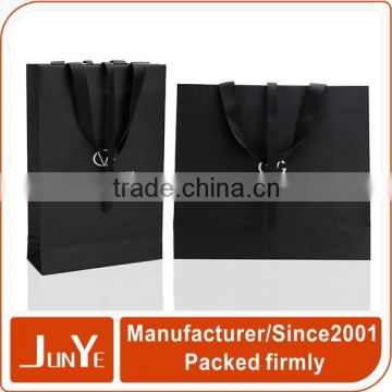 Good quality glossy printed flat ribbon handle retail shopping paper bag                        
                                                Quality Choice