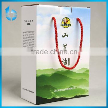 Corrugated paper packaging box for China tea-seed oil packing box with nylon string