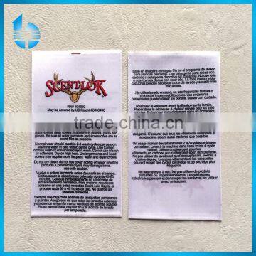 Flexographic printed satin ribbon washing care tag trademark for jacket