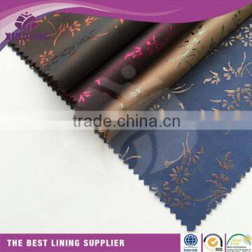 China manufacturer garment cationic TR jacquard lining fabric