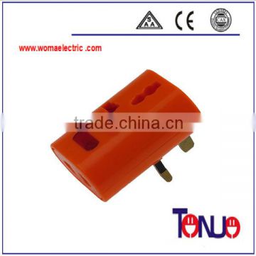 orange color 13A travel plug socket power adapter