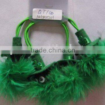 Green plastic ponytail holder