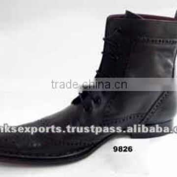 Paddock style black leather boots well worn