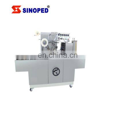 Perfume box cellophane overwrapping machine