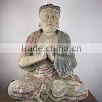 wood sitting buddha statu