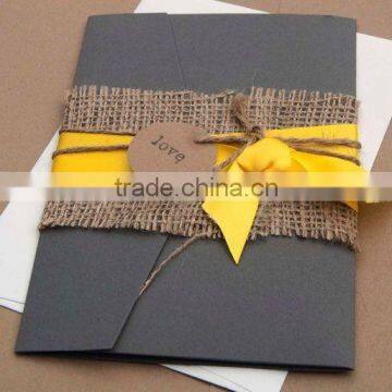 deep black card linen paper blet with yellow silk ribbon weddin gpocketfold wedding invitations card