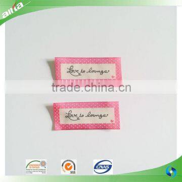 Allta Group customize woven label for kids clothes with/without border