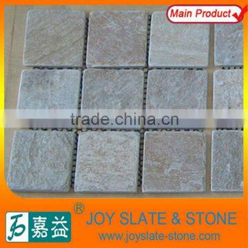 Flagstone tile with mesh mat on paving in house floor decorative