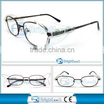 Safety glasses with metal optical frame optic design