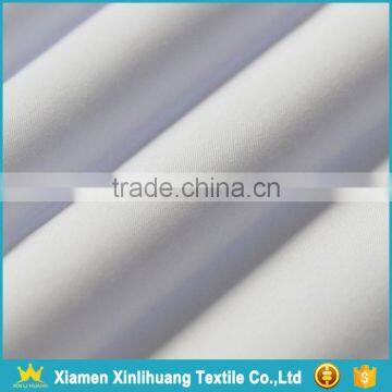 China Supplier White 65% Polyester 35% Cotton Plain Shirting Fabric photo-2