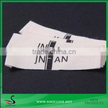 Sinicline Design custom white logo woven label end fold