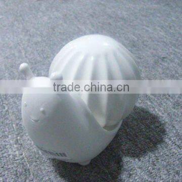 white porcelain snail