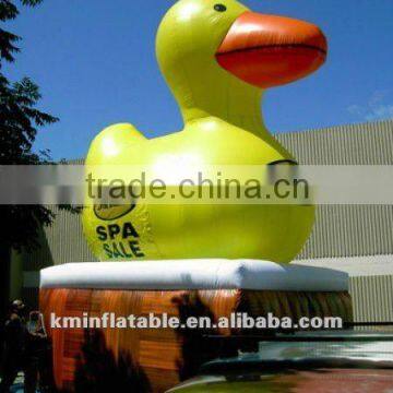 Yellow inflatable duck in tub