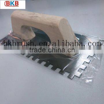 Notched Manganese steel plastering trowel with wood handle