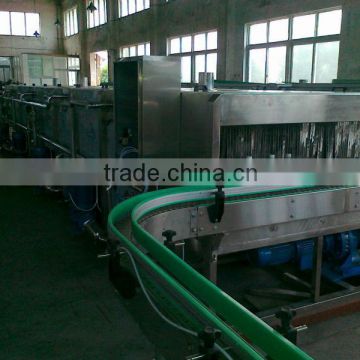 Continuous spray tunnel pasteurizer