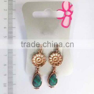 Graceful brassy sunflower with turquoise dangle earring                        
                                                Quality Choice