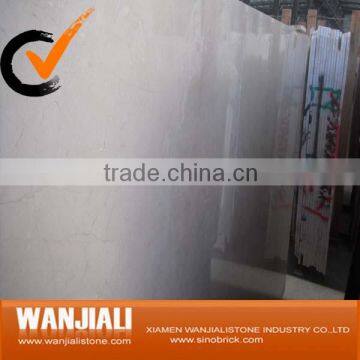 Crema Marfil beige marble slabs