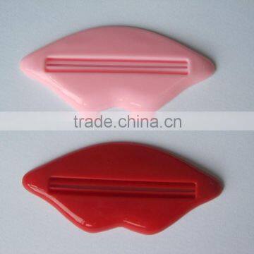 plastic mouth shape toothpaste holder squeezer